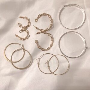 NWOT gold plated five pairs of pierced earrings never used. 5 pairs for $5